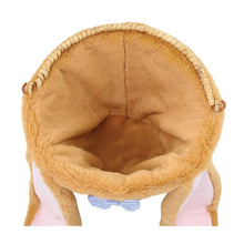 Woven bunny Easter basket interior with tan plush lining and braided handle