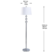 Tall standing lamp with white fabric drum shade and chrome beaded column base.