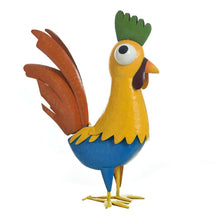 Yellow and blue metal chicken decoration with orange wings, green crest, and black beak