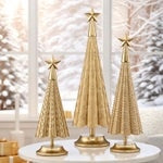 Set of three gold-tone metal holiday trees with star toppers and round bases