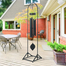 Metal wind chime stand, black arched frame with hanging chime and tripod base.