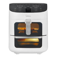 White dual basket air fryer oven with open front door and central pull handle