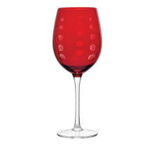 Ruby red wine glass with raised dot pattern on the upper bowl