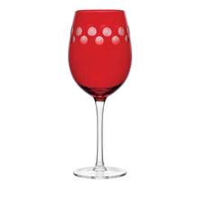 Ruby red wine glass with bubble dot pattern across the bowl