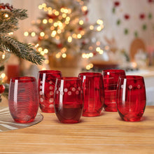 Set of ruby stemless wine glasses with assorted patterns on the bowls