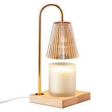 Electric candle warmer lamp with gold arch stand, ribbed glass shade, candle on wood base