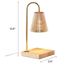 Electric candle warmer lamp with tall gold arch, ribbed glass shade, candle on wooden base