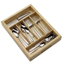 Stainless steel flatware set in wooden caddy compartments, forks spoons knives