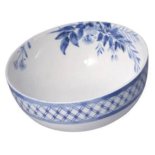 Blue-and-white floral serving bowl with grid pattern on rim