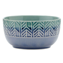 Stoneware bowl in teal with blue chevron pattern band and smooth rounded base