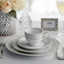 Mikasa parchment porcelain dinnerware set table setting with teacup, saucer, and plates
