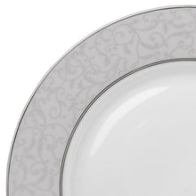 Porcelain dinner plate rim with light gray floral scroll pattern and dark border