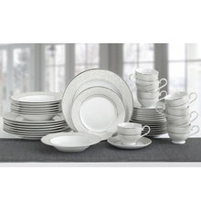 Mikasa parchment porcelain dinnerware set with cups, saucers, and stacked plates