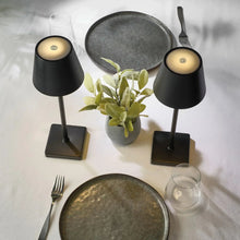 Black rechargeable LED table lamps with matte shades and square bases, touch controls