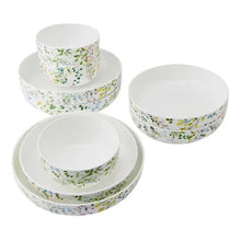 Floral bone china bowl set, four stacked white round bowls with garden pattern
