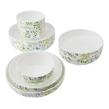 Bone china bowl set, white with multicolor leaf-and-flower border, stacked bowls