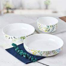 Round bone china bowls, white with botanical floral band, three bowls on display