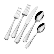 Stainless steel flatware set with forks, knife, and two spoons