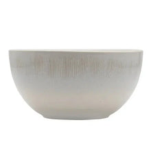 Gray ombre ceramic bowl with white interior and textured exterior