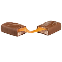 Chocolate candy bar halves with golden caramel center