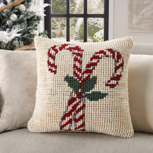 Cream beaded holiday pillow with red-and-white swirl and green holly