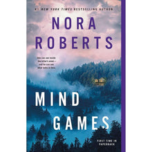 Paperback book with Nora Roberts title, Mind Games, featuring purple forest scene artwork.