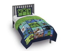 Kids comforter and pillowcase set with green reversible top and blue pixel scene panel