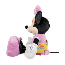 Minnie Mouse plush toy back view, pink skirt and swing tag visible