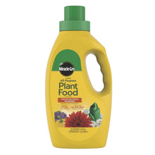 Liquid plant food concentrate bottle, yellow with green cap and handle