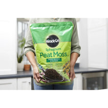 Miracle-Gro Sphagnum peat moss bag, green package with dark soil illustration