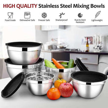 Stainless steel mixing bowls with black lids, nested with smaller bowl included