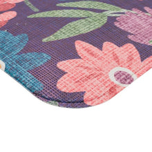 Floral kitchen mat corner with rounded edge and pastel flower design