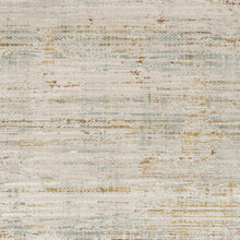 Ivory area rug with light gray mottled texture and small rust-colored speckles