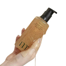 Hypoallergenic LHA CIS gel cleanser with pump; amber gel on dispenser in hand