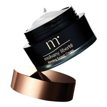 Firming expert cream jar partly opened, rose-gold lid and black label