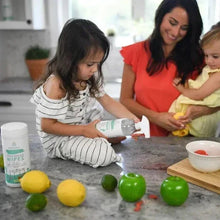 Woman and child cleaning a table with lemon-scented cleaner
