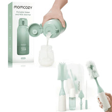 Portable milk warmer kit in mint green with brush and bottle, milk being poured