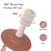 360° silicone toothbrush head with white soft bristles on brown suction handle