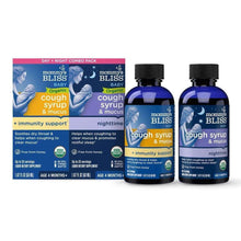 Day and night organic cough syrup set: two blue bottles with black caps and box