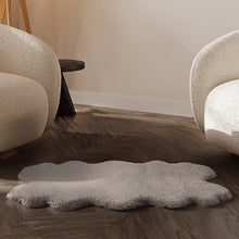 Gray faux fur mini quad rug, shaggy pile, 24 x 39 in, rectangular shape