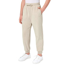Beige youth jogger pants with elastic drawstring waist and tapered cuffs