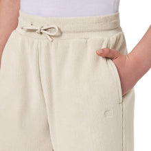 Beige youth jogger waistband close-up with elastic drawstring and ribbed hem