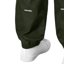 Kids rain set rain pants in dark black, elastic ankle cuffs with light reflective detail