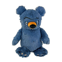 Giant blue plush bear with orange snout, open mouth, big ears, seated
