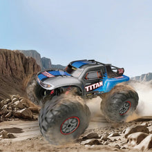 2WD RC truck car with blue-and-silver body and oversized black off-road tires