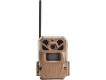 Tan trail camera front view with four lens openings and mounting latch