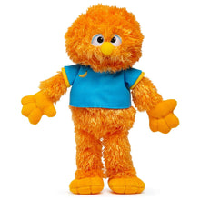 Orange bird plush with blue shirt and yellow beak, full-body standing view