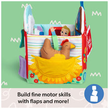 Open foldable plush farm toy with soft animal flaps and textured interior pages