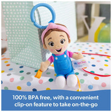Sensory take-along plush with clip-on feature, blue handle loop and attached rattle ball