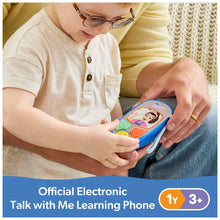 Kids learning talk phone, blue handset with colorful buttons, held during conversation play